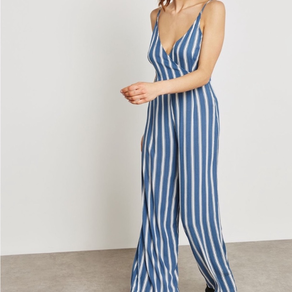 Forever 21 stripped jumpsuit size medium
